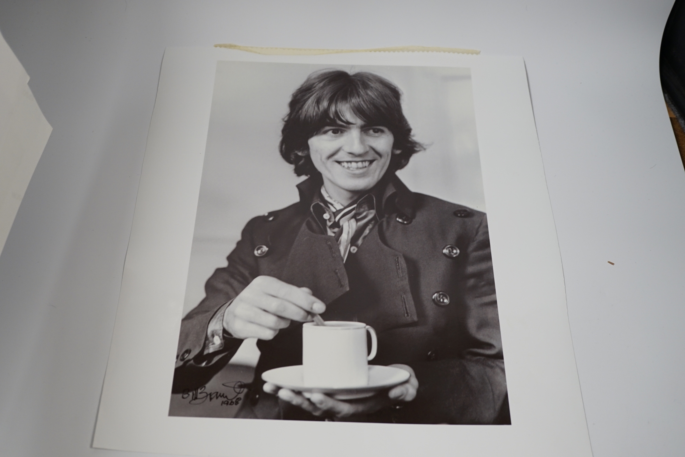 Three photographs of the Beatles by Bill Zygmant; John Lennon, Ringo Starr and George Harrison, all signed by Zygmant and two dated 1968, largest 48 x 33cm